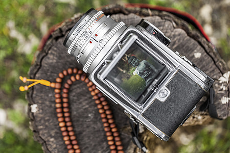 black and gray DSLR camera thumbnail
