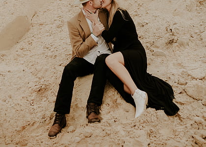 man and woman on sand thumbnail