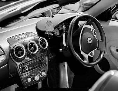 black and silver Ferrari car interior thumbnail