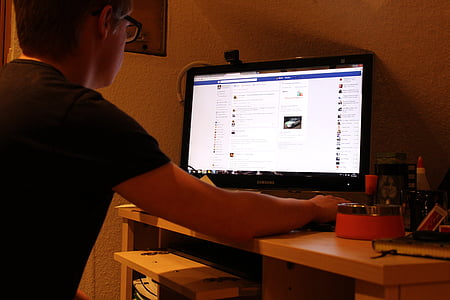 man near turned on computer monitor thumbnail