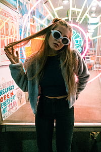 woman wearing gray jacket and black bottoms thumbnail