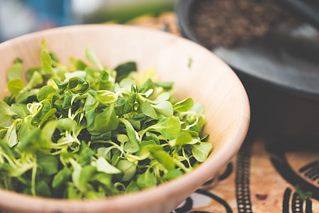 Wooden Bowl with Fresh Basil Leaves thumbnail