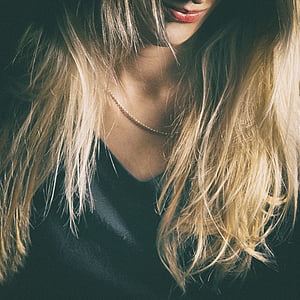 woman wearing black scoop-neck top thumbnail