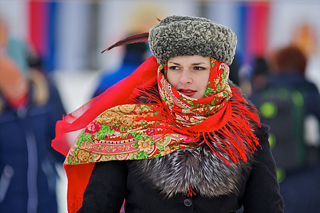 photo of woman wearing red and green floral shawl thumbnail