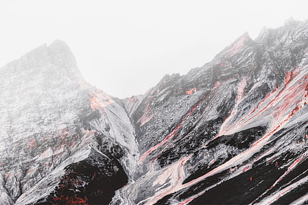 red lava flowing from mountain close up photography thumbnail