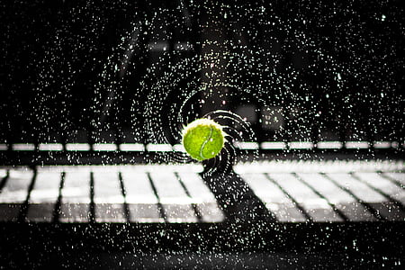 timelapse photography of green tennis ball thumbnail