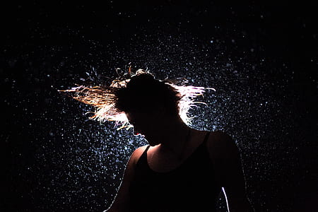 silhouette of man waving his hair thumbnail