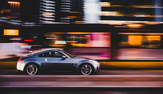 time lapse photography of gray car thumbnail