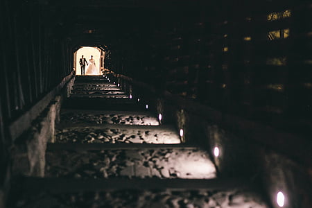 couple walking down on staircase thumbnail
