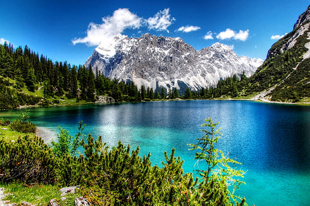 snowy mountain near the lake thumbnail