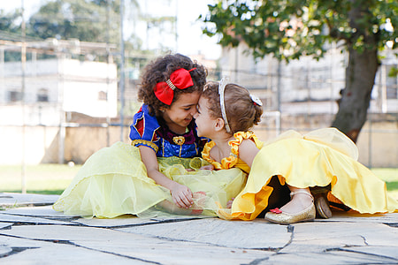 two girls wearing costumes photography during daytime thumbnail