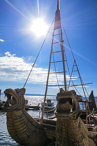 brown boat on body of water thumbnail