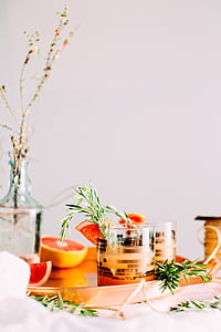 clear drinking glasses beside sliced limes thumbnail