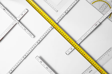 high photo of yellow and white tape measures thumbnail