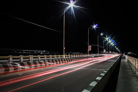 time-lapse photography of road light thumbnail