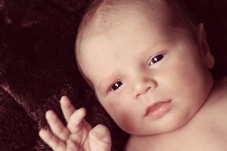 baby raising a finger thumbnail