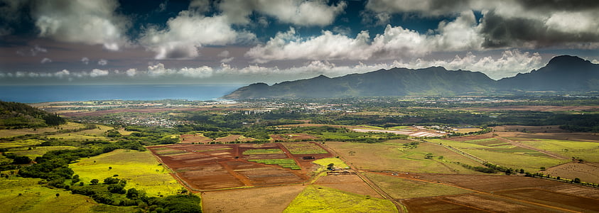 green and brown plains and mountain thumbnail