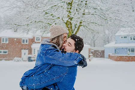 man embracing woman and woman kissing man thumbnail