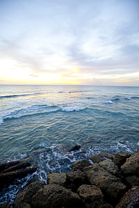 sea waves crashing boulders thumbnail