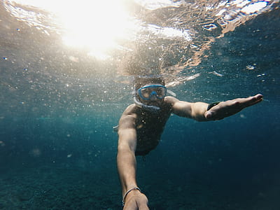 person swimming in water thumbnail