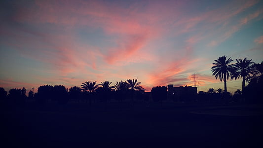 silhouette of city in golden hour photography thumbnail