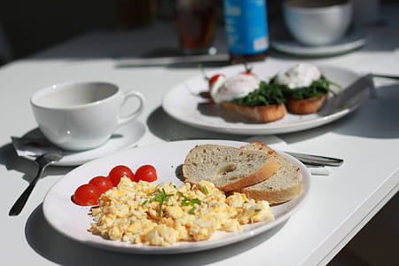toasted bread and tomato on white ceramic plate thumbnail