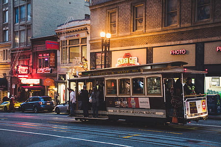 Gray and Black Tram during Night Time thumbnail