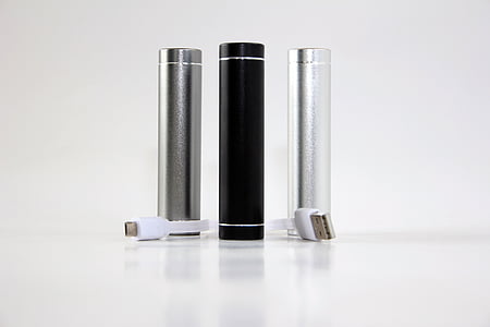 two silver and one black power banks thumbnail