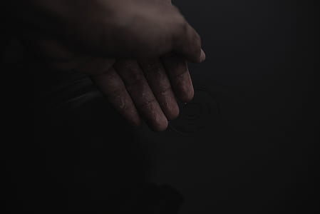 person showing left hand thumbnail