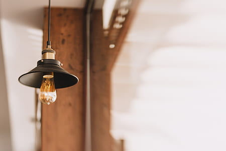 Shallow Focus Photography of Black and Orange Pendant Lamp thumbnail