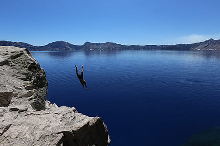 Photo of Man Diving in to Water thumbnail