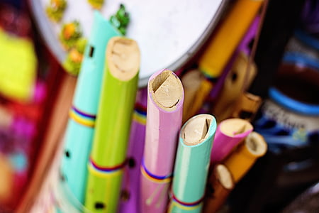 selective focus photo of assorted color of flutes during daytime thumbnail