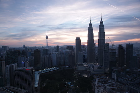aerial photography of cityscape under gray sky thumbnail
