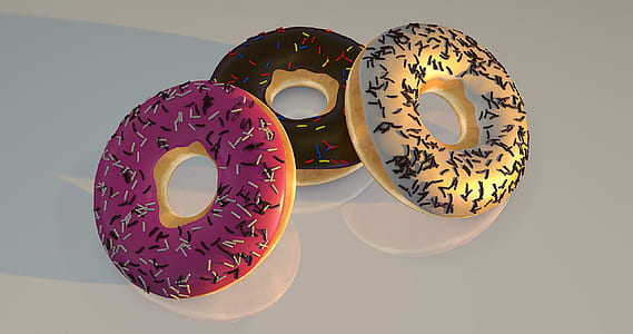 three assorted-flavour doughnuts thumbnail