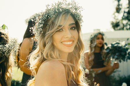 woman wearing floral headdress thumbnail