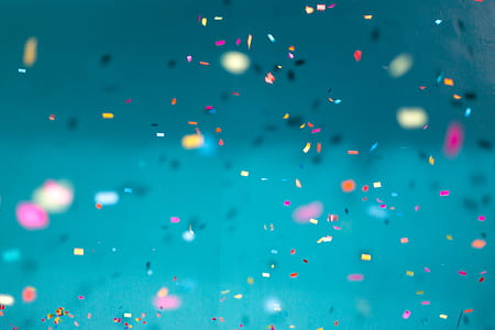 confetti floating over blue surface thumbnail