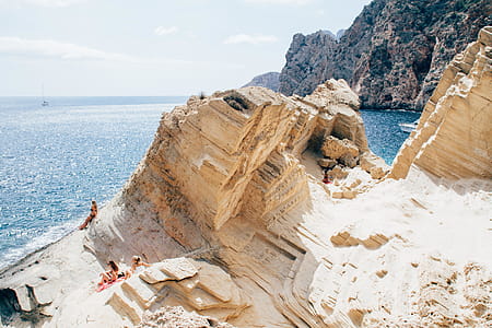 Landscape Photography of Cliff Near Body of Water thumbnail