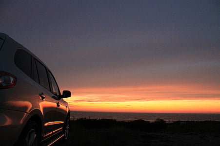 gray car parked during golden hour thumbnail