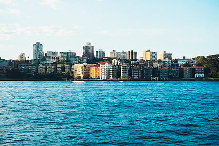 calm body of water near buildings thumbnail