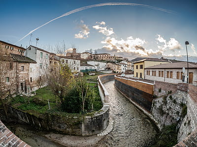 fish-eye photography of assorted-color concrete buildings at daytime thumbnail