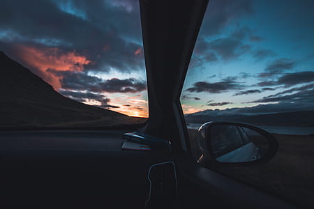 low light photography of car wing mirror thumbnail