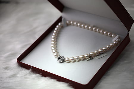 white pearl necklace on black box thumbnail
