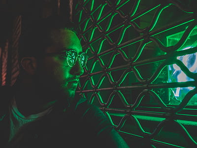 man standing near window thumbnail