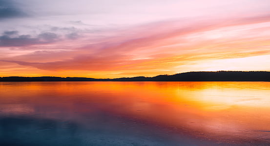 body of water during dawn thumbnail