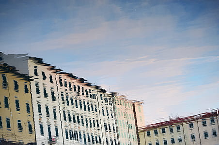 white concrete building under blue sky at daytime thumbnail