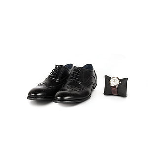 black leather dress shoes beside watch thumbnail