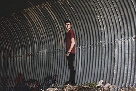 man standing on rock thumbnail