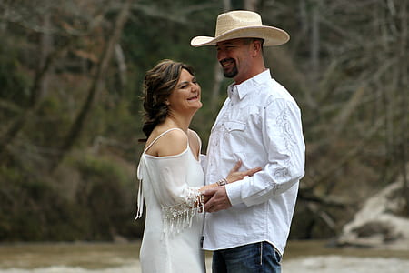 man and woman making face while hugging during daytime thumbnail