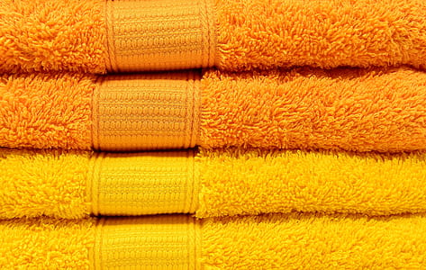 closeup photo of two yellow and two orange towels thumbnail