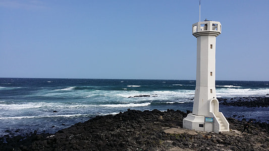 lighthouse during daytime thumbnail